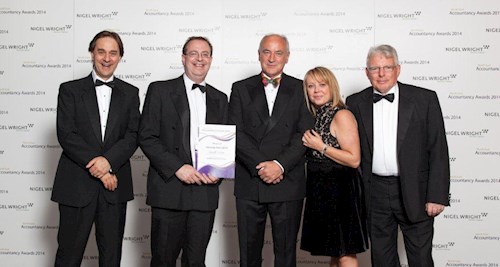 Geoff Little receives Unsung Hero award from Colin Briggs